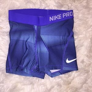 Blue patterned Nike pros